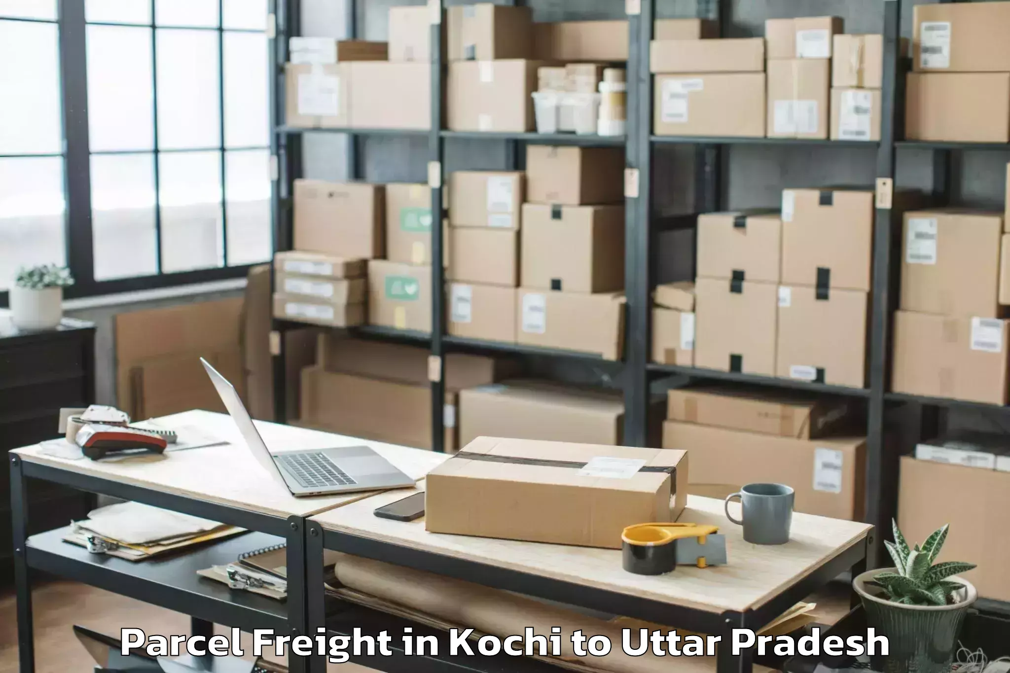 Book Your Kochi to Manjhanpur Parcel Freight Today